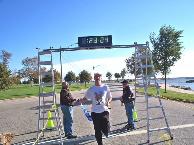 Jeff crossing the finish line of the 5k race